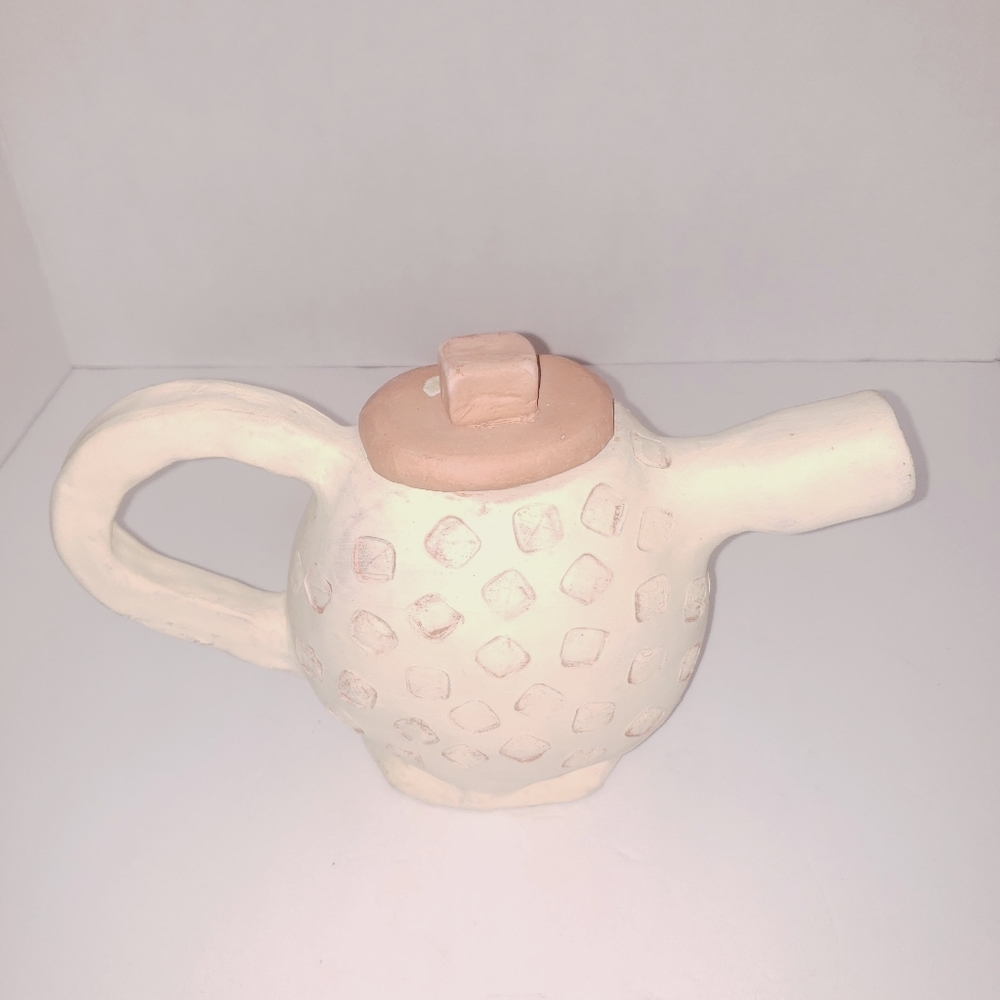 Handmade clay teapot